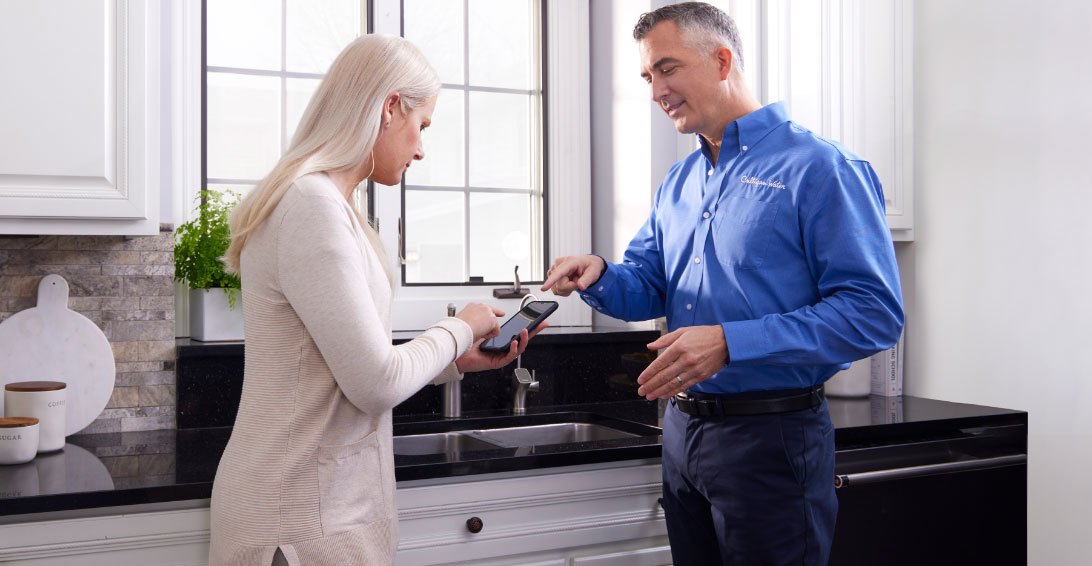 Culligan Water expert helping a customer
